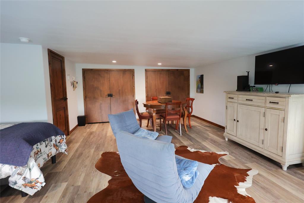 1250 County Road Brady, TX 76825 - Photo 22 of 40 a living room with furniture appliances and a flat screen tv