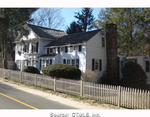 68 Spring Street Chester, CT 06412 - Photo 1 of 1 a view of a house and a yard