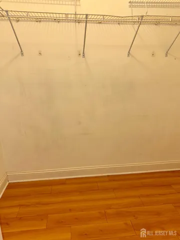 a bathroom with a sink a mirror and a bathtub