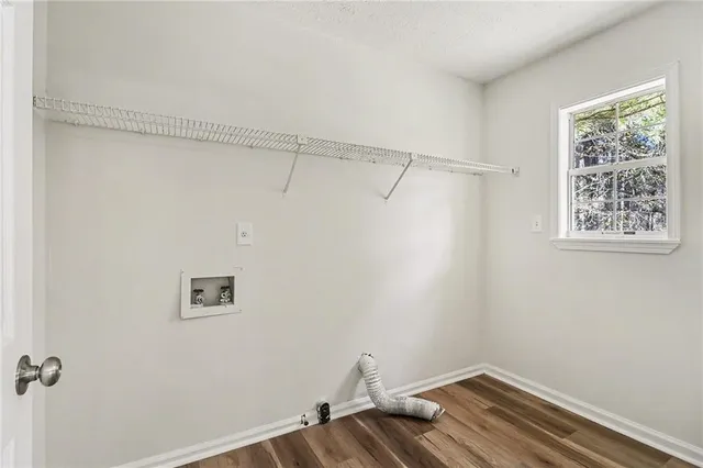 a view of a small space with racks on the wall