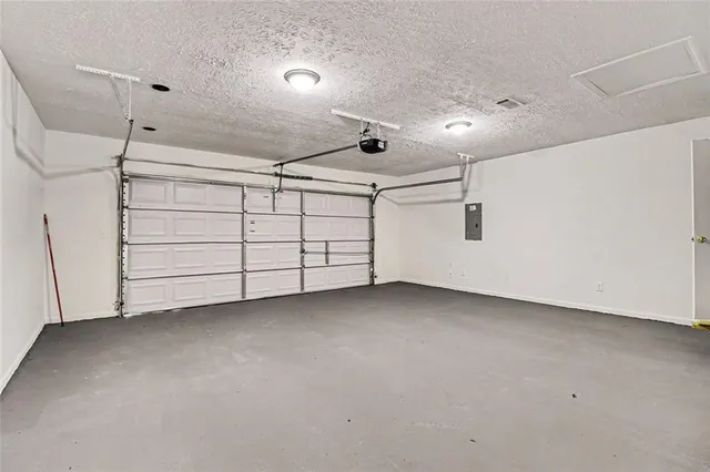 a view of empty space with wooden fence