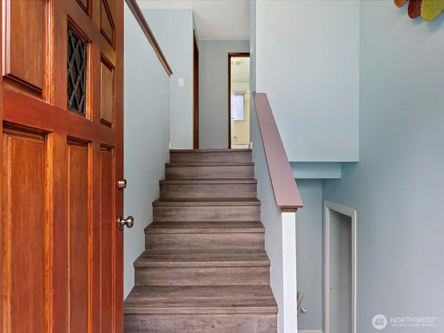 a view of entryway with a front door
