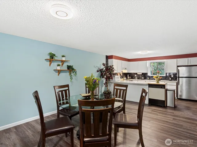 a view of a dining room with furniture