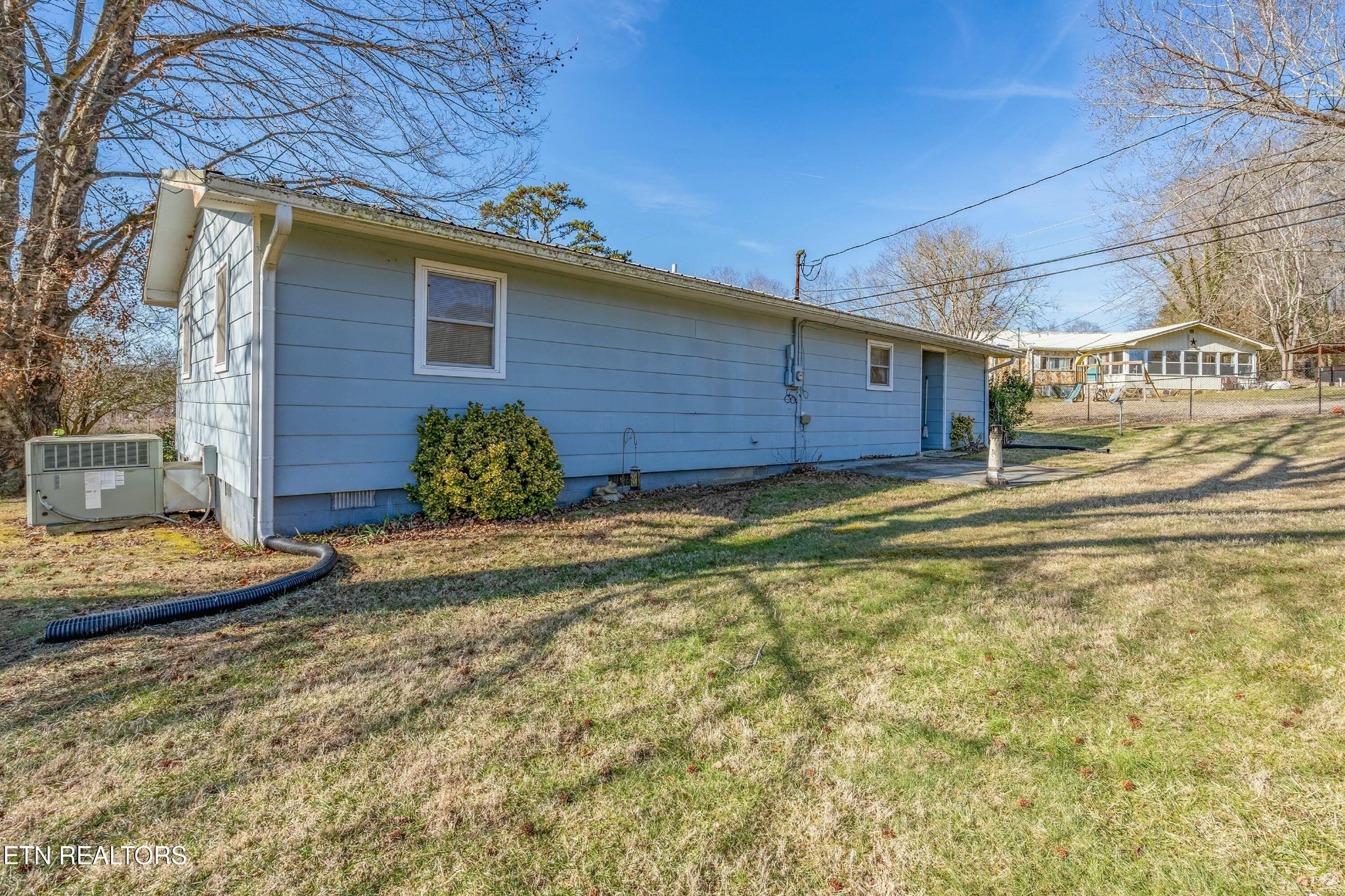 1747 Fairview Road Oliver Springs, TN 37840 - Photo 18 of 20 a view of a house with a yard