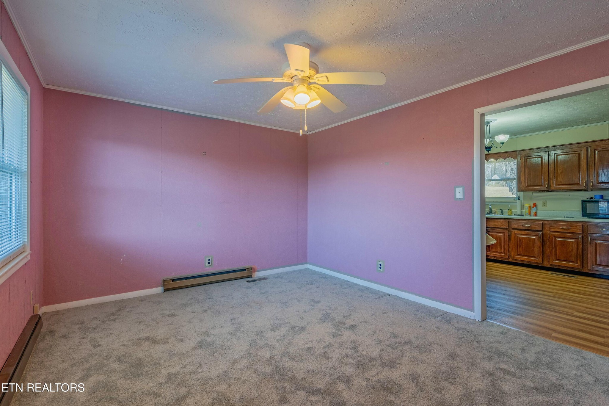 1747 Fairview Road Oliver Springs, TN 37840 - Photo 2 of 20 an empty room with fan