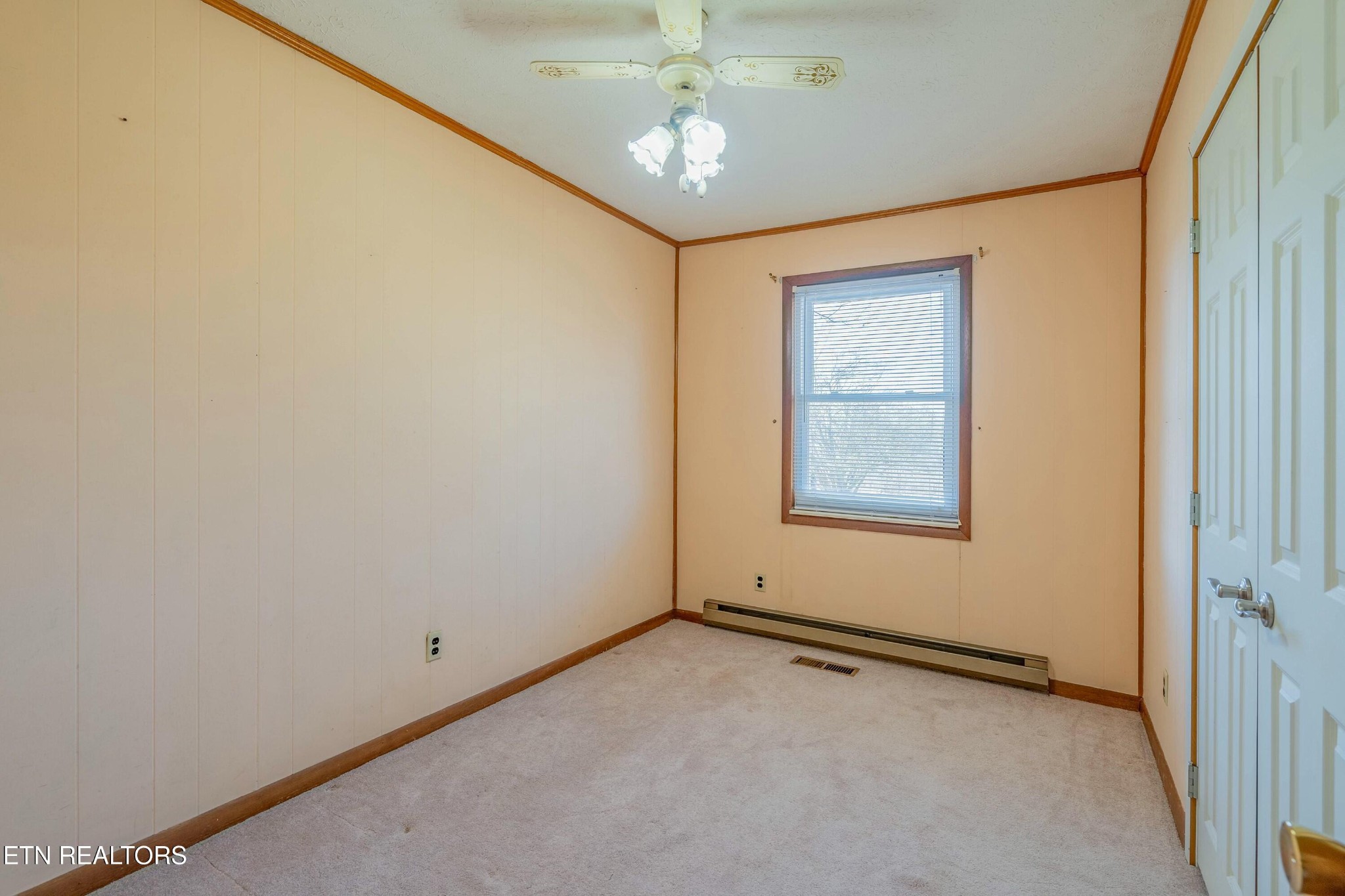 1747 Fairview Road Oliver Springs, TN 37840 - Photo 7 of 20 an empty room with a window