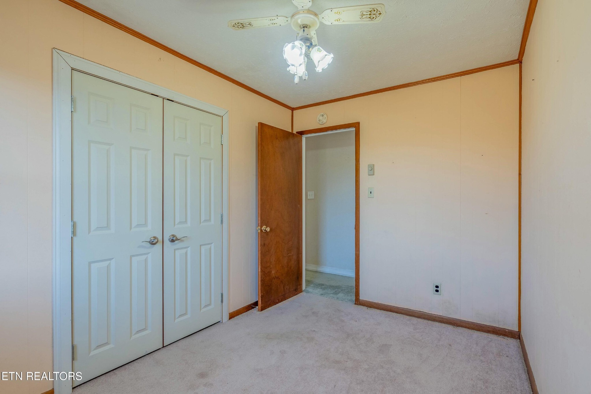 1747 Fairview Road Oliver Springs, TN 37840 - Photo 8 of 20 a view of a chandelier fan and closet area