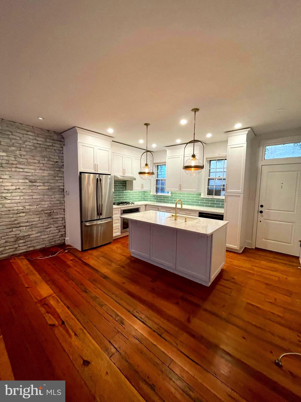 1835 Addison Street Philadelphia, PA 19146 - Photo 4 of 32 Living room back to kitchen
