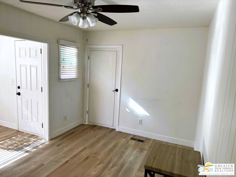 17850 Corkill Road, Unit 94 Desert Hot Springs, CA 92241 - Photo 18 of 39 a view of an empty room and window