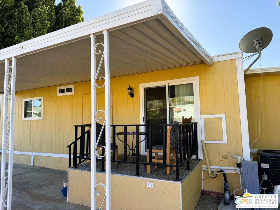 17850 Corkill Road, Unit 94 Desert Hot Springs, CA 92241 - Photo 5 of 39 a view of a house with wooden floor and furniture