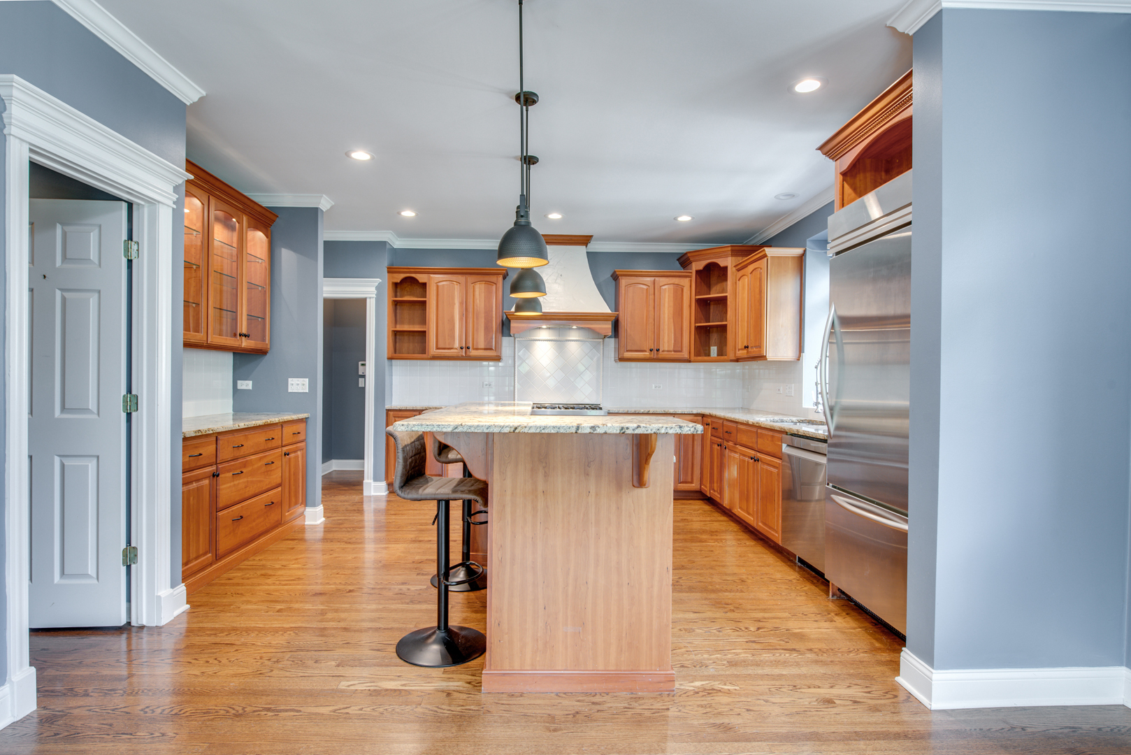 1736 Robert Lane Naperville, IL 60564 - Photo 14 of 69 a kitchen with stainless steel appliances granite countertop a sink a stove and oven
