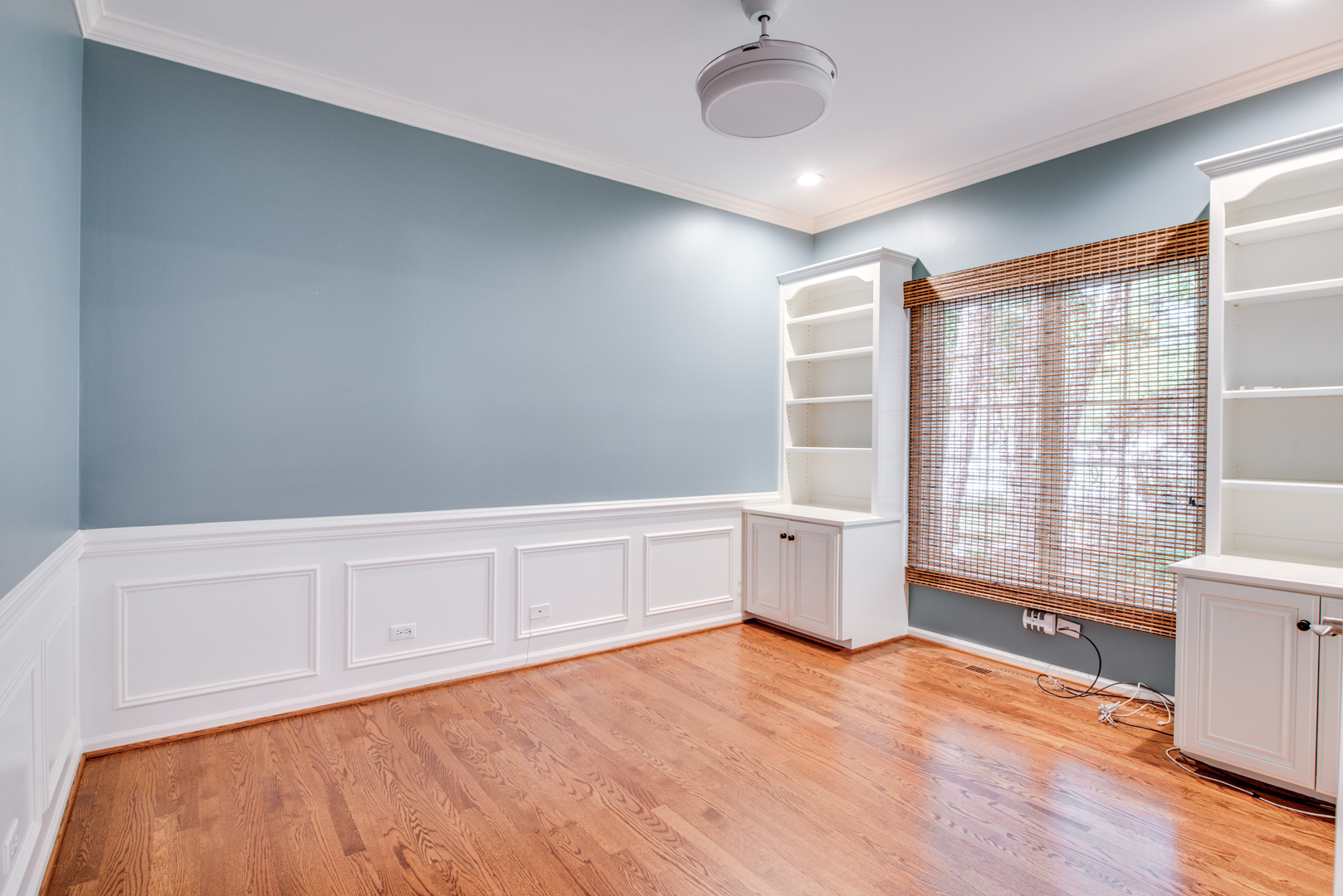 1736 Robert Lane Naperville, IL 60564 - Photo 22 of 69 a view of an empty room with a window and wooden floor