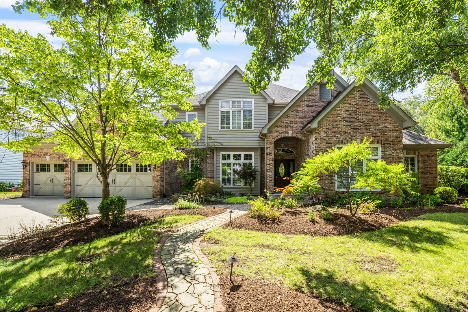 1736 Robert Lane Naperville, IL 60564 - Photo 54 of 69 a front view of a house with a yard