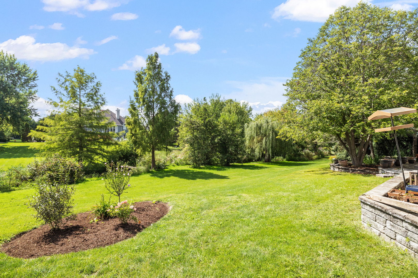 1736 Robert Lane Naperville, IL 60564 - Photo 56 of 69 a view of a backyard with swimming pool