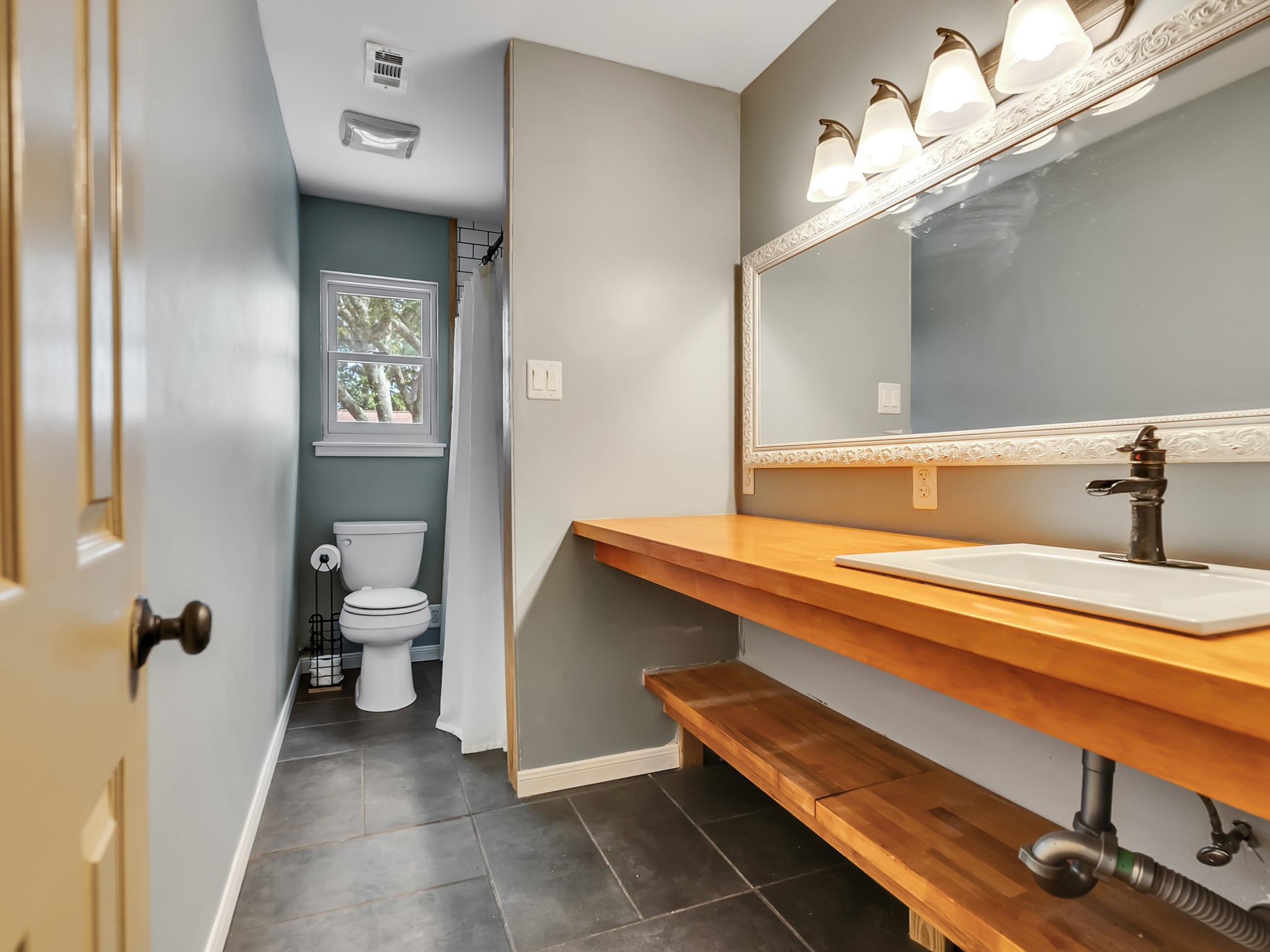 3819 Shipman Lane Spring, TX 77388 - Photo 24 of 36 Modern secondary bathroom featuring updated fixtures and finishes.