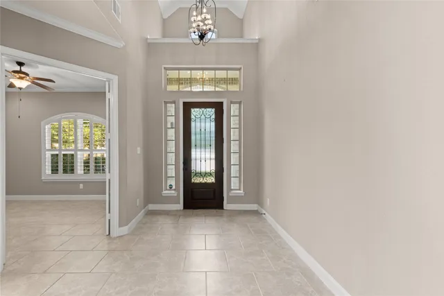 a view of a hallway with windows