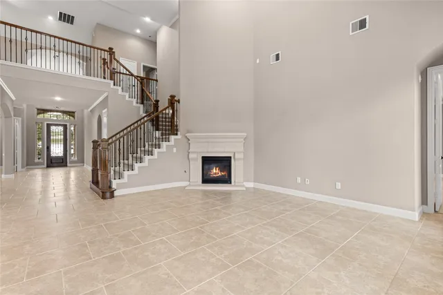 a kitchen with stainless steel appliances granite countertop wooden cabinets a stove top oven a sink and dishwasher