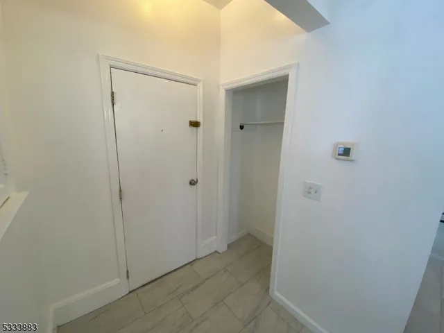 a view of a bathroom with shower
