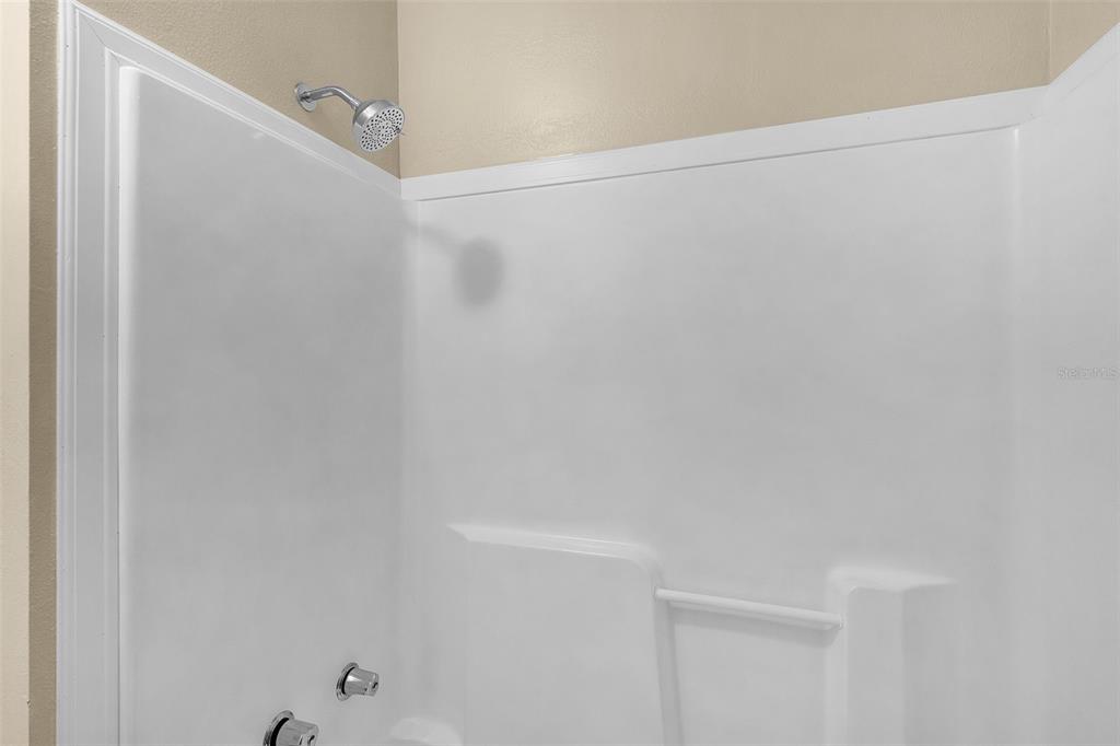 2245 Northwest 63rd Place Ocala, FL 34475 - Photo 31 of 38 a bathroom with a shower