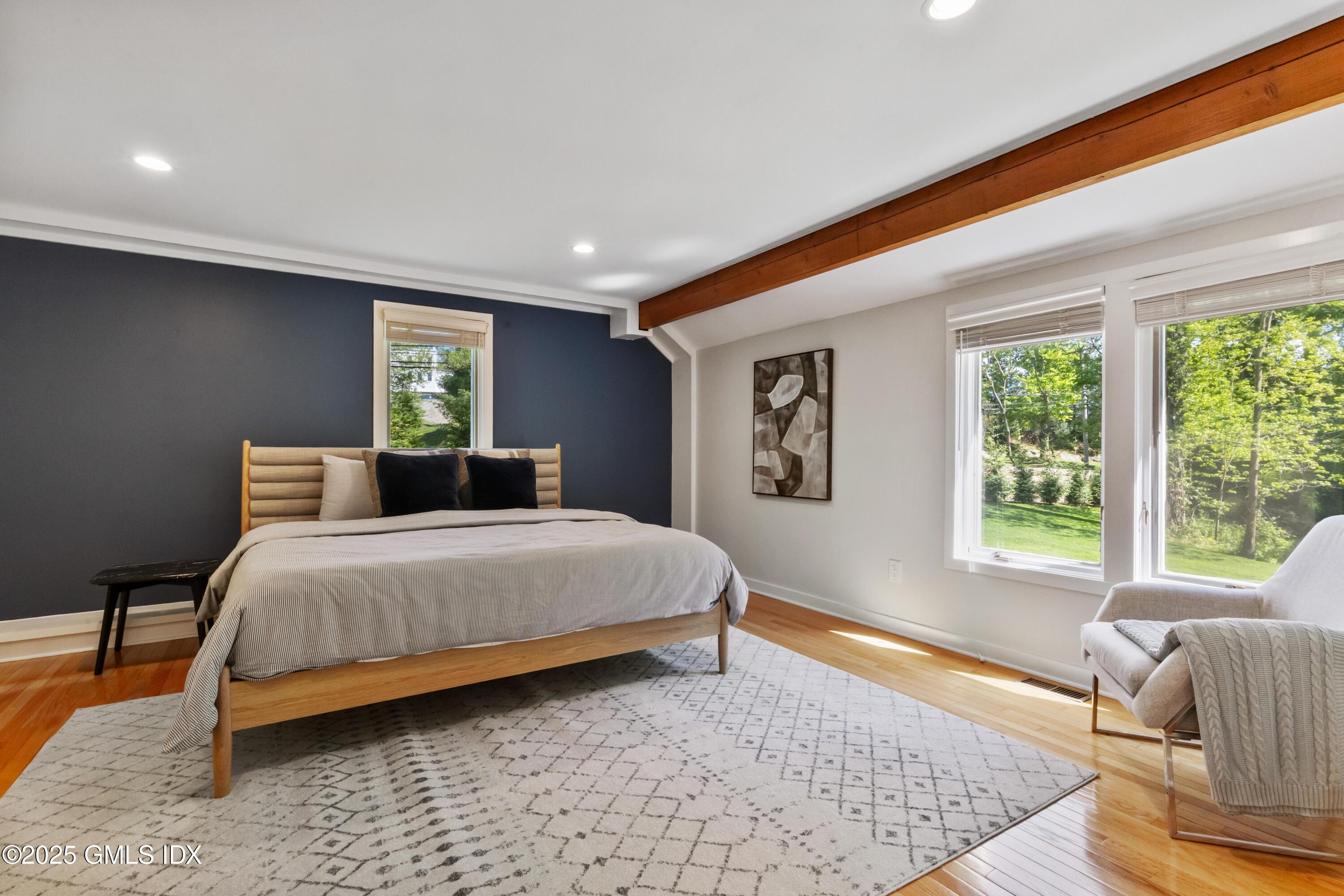 254 Stanwich Road Greenwich, CT 06830 - Photo 15 of 52 a bedroom with a bed and a window