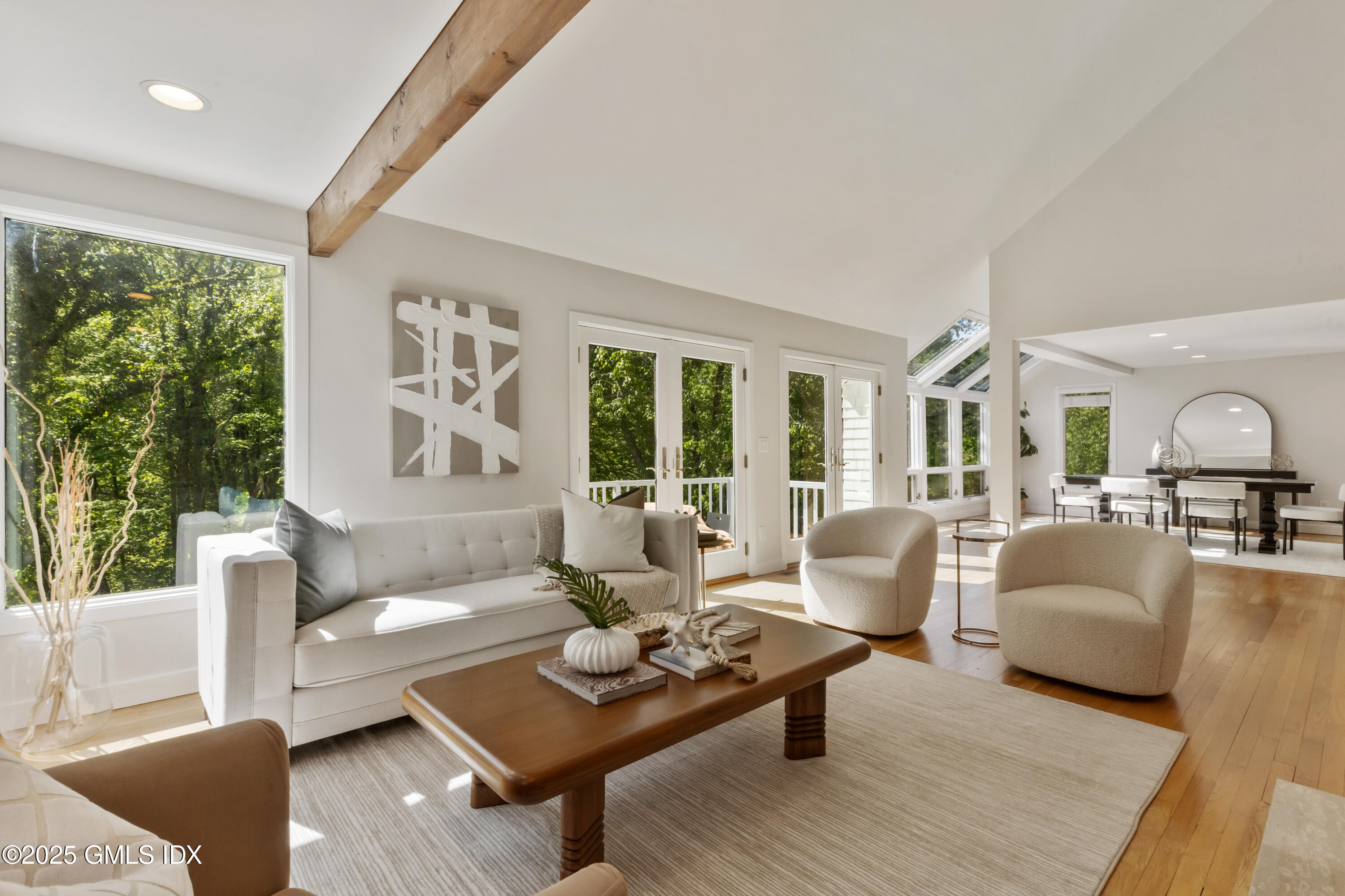 254 Stanwich Road Greenwich, CT 06830 - Photo 2 of 52 a living room with furniture and a large window