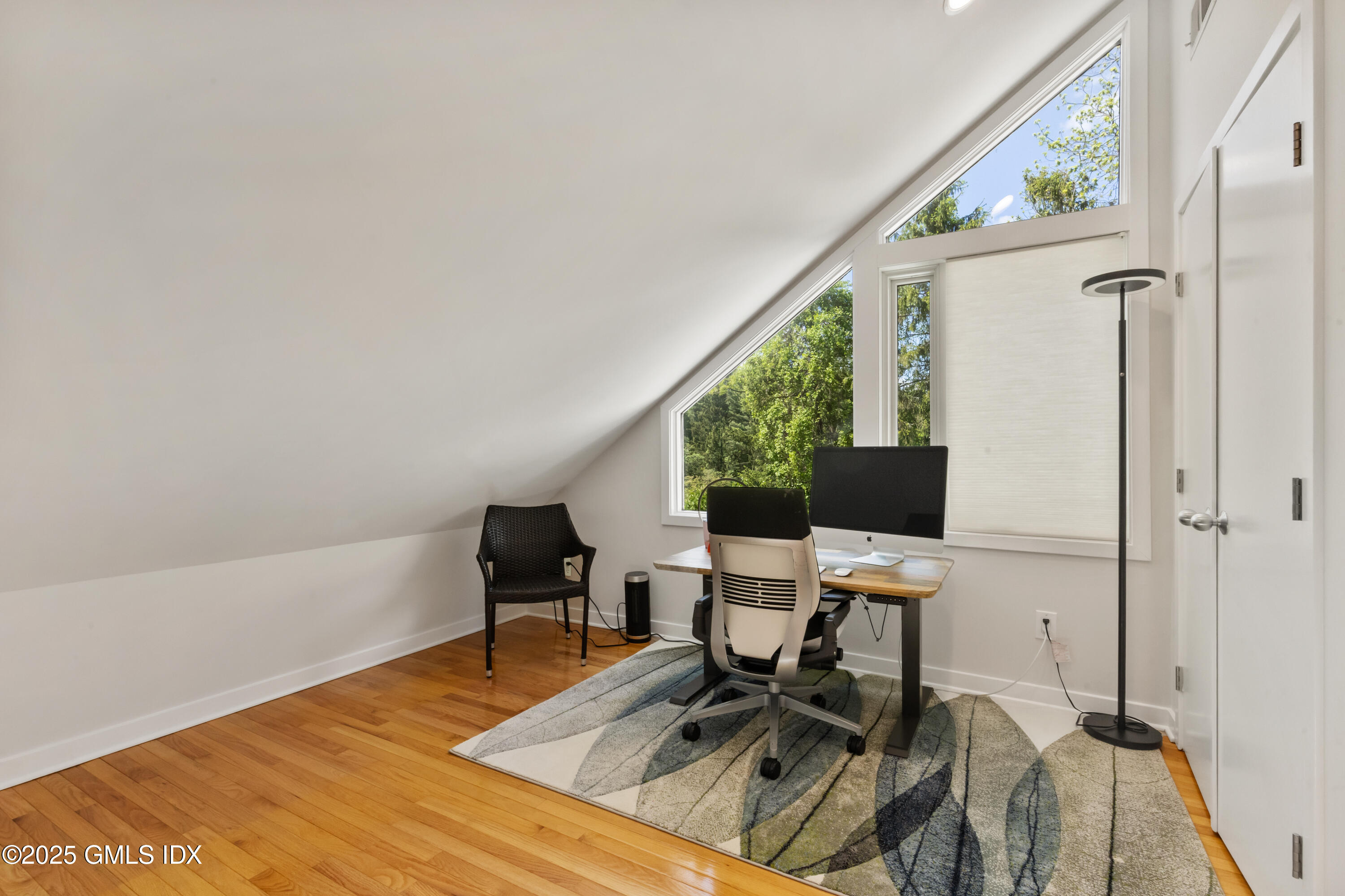 254 Stanwich Road Greenwich, CT 06830 - Photo 27 of 52 a workspace with furniture and a gate