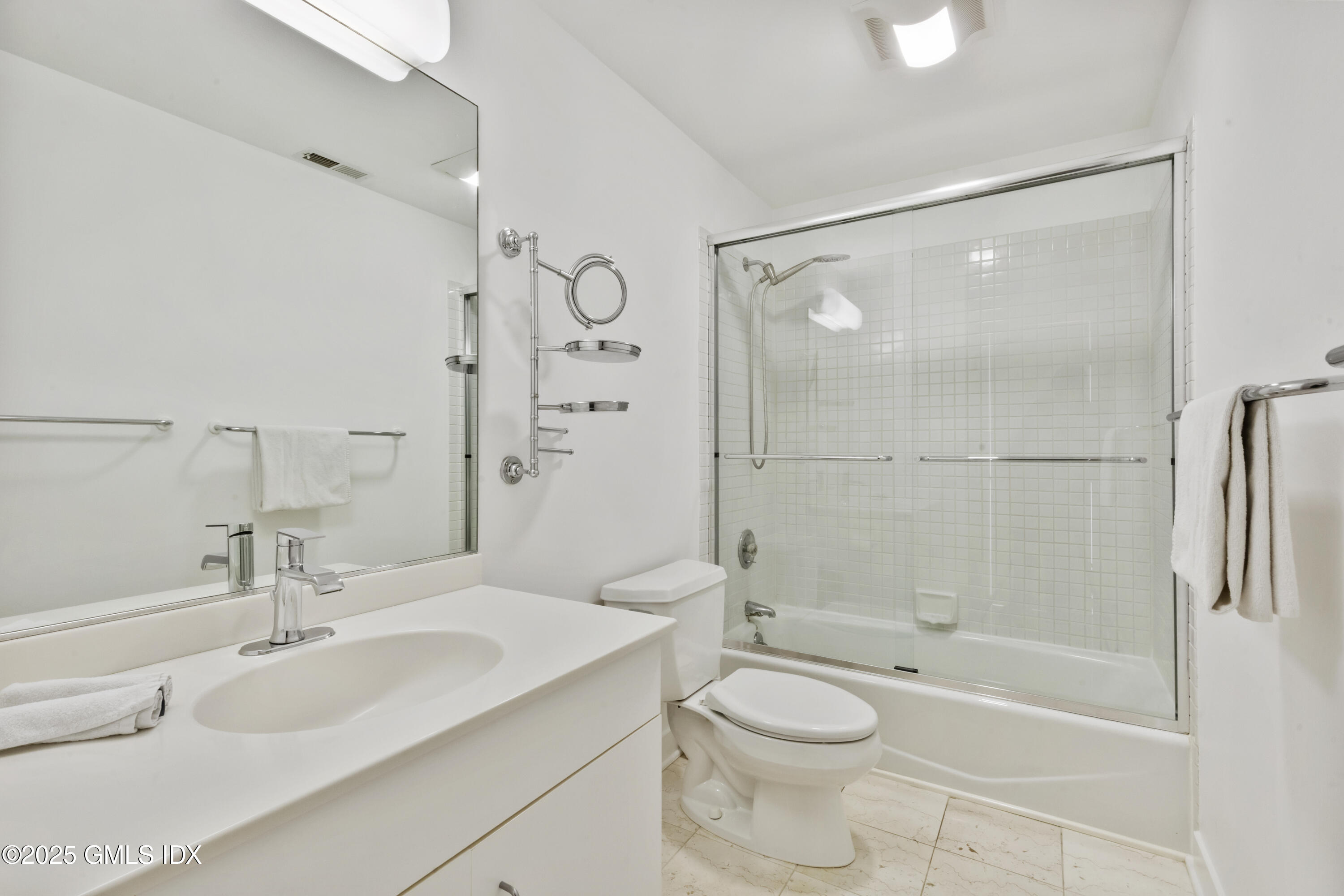 254 Stanwich Road Greenwich, CT 06830 - Photo 28 of 52 a bathroom with a sink toilet and shower