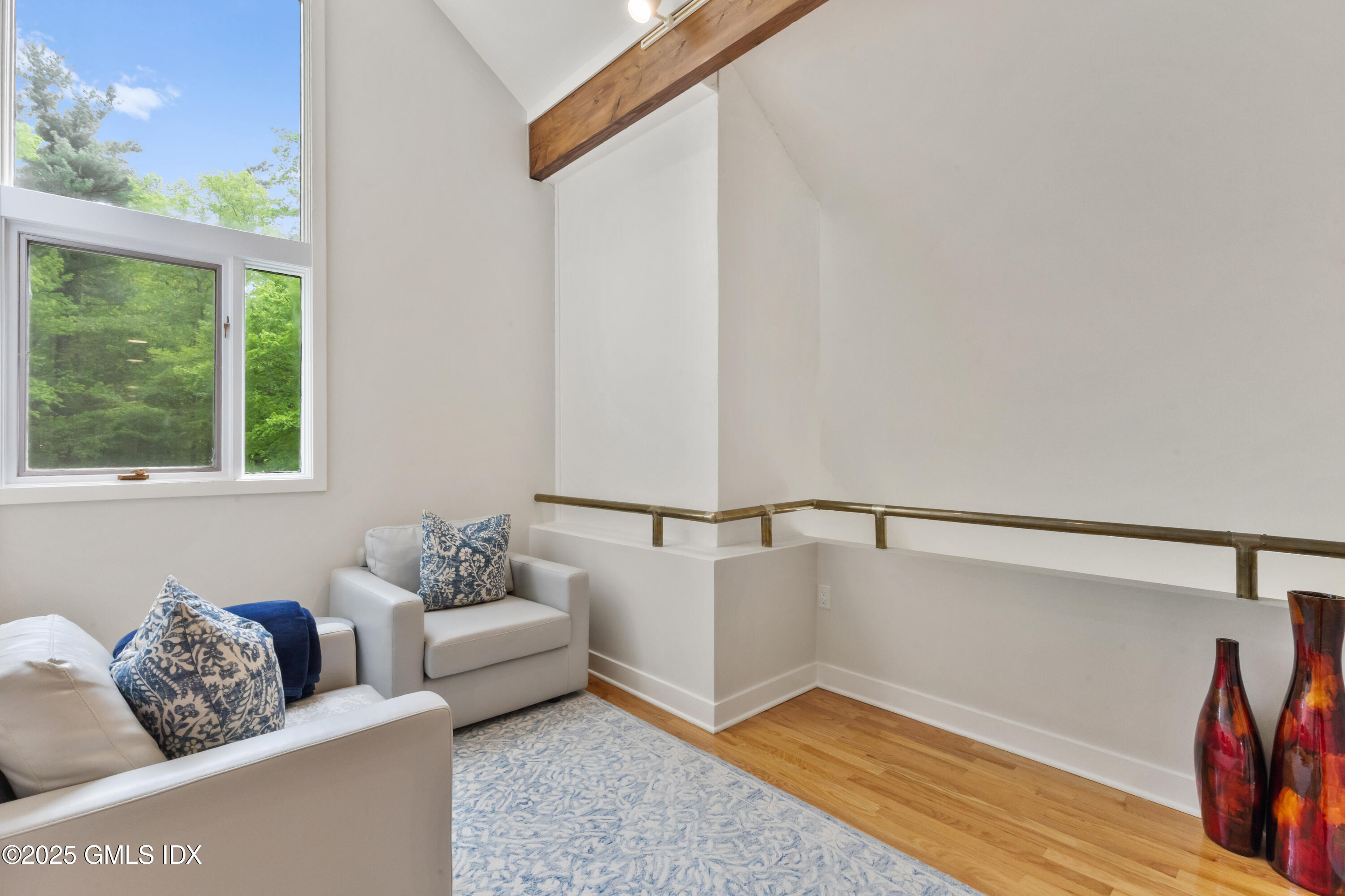 254 Stanwich Road Greenwich, CT 06830 - Photo 29 of 52 a living room with furniture and a window