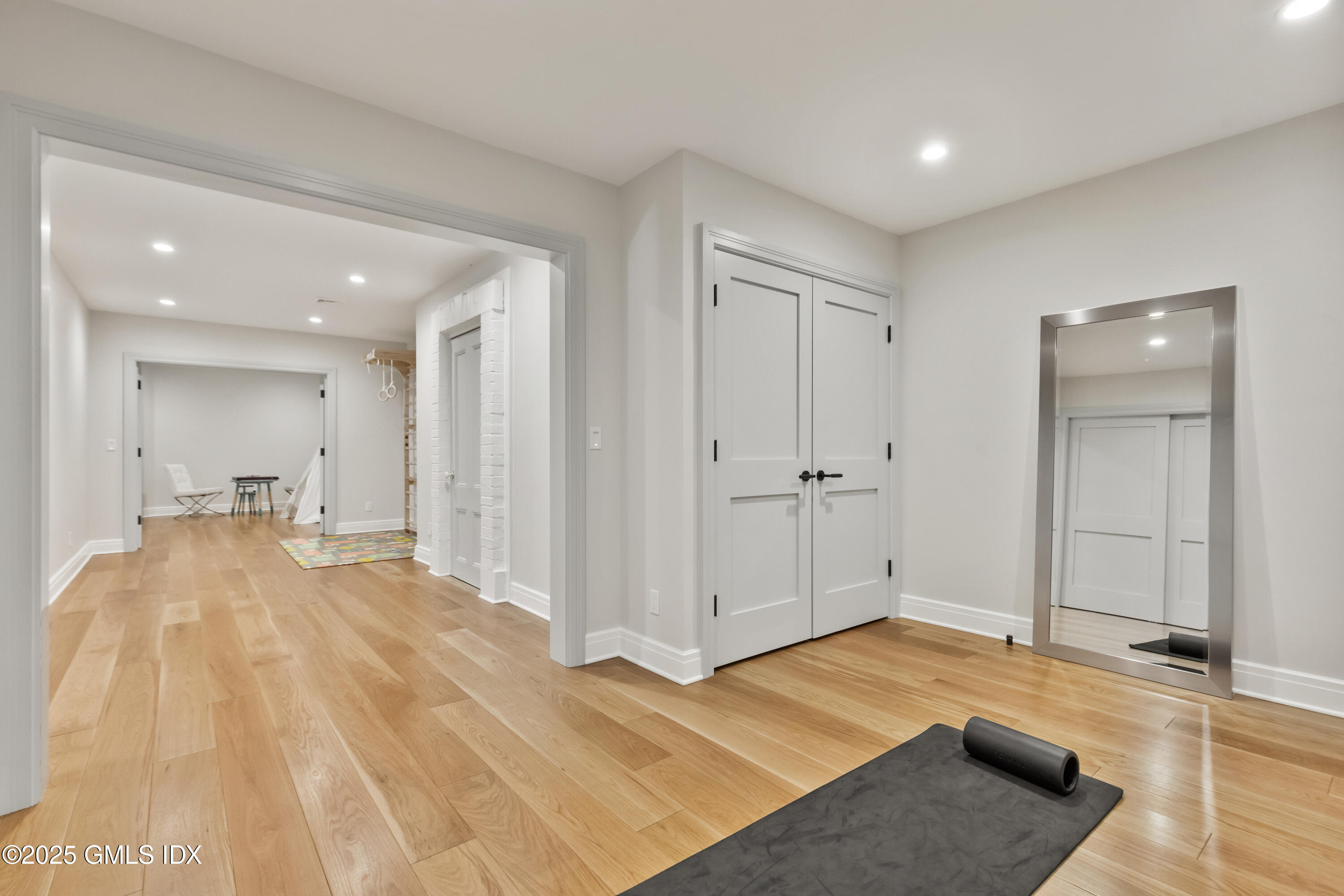 254 Stanwich Road Greenwich, CT 06830 - Photo 36 of 52 a spacious bedroom with a bed and walk in closet