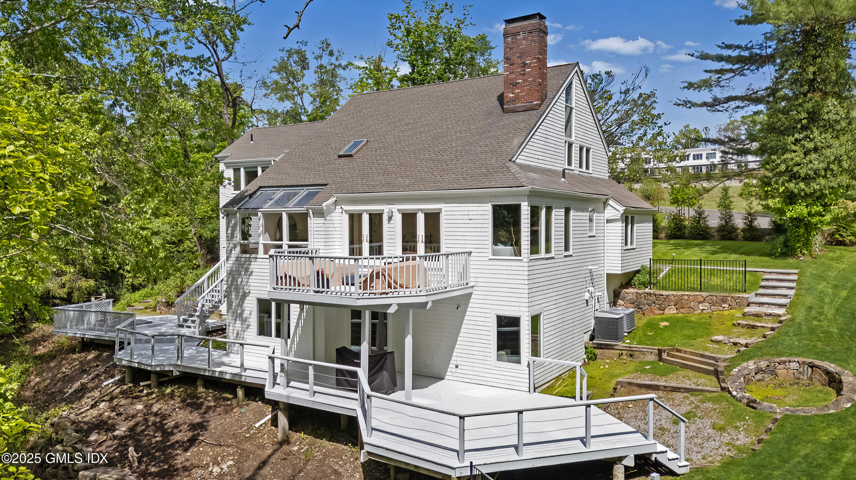 254 Stanwich Road Greenwich, CT 06830 - Photo 40 of 52 an aerial view of a house with a yard