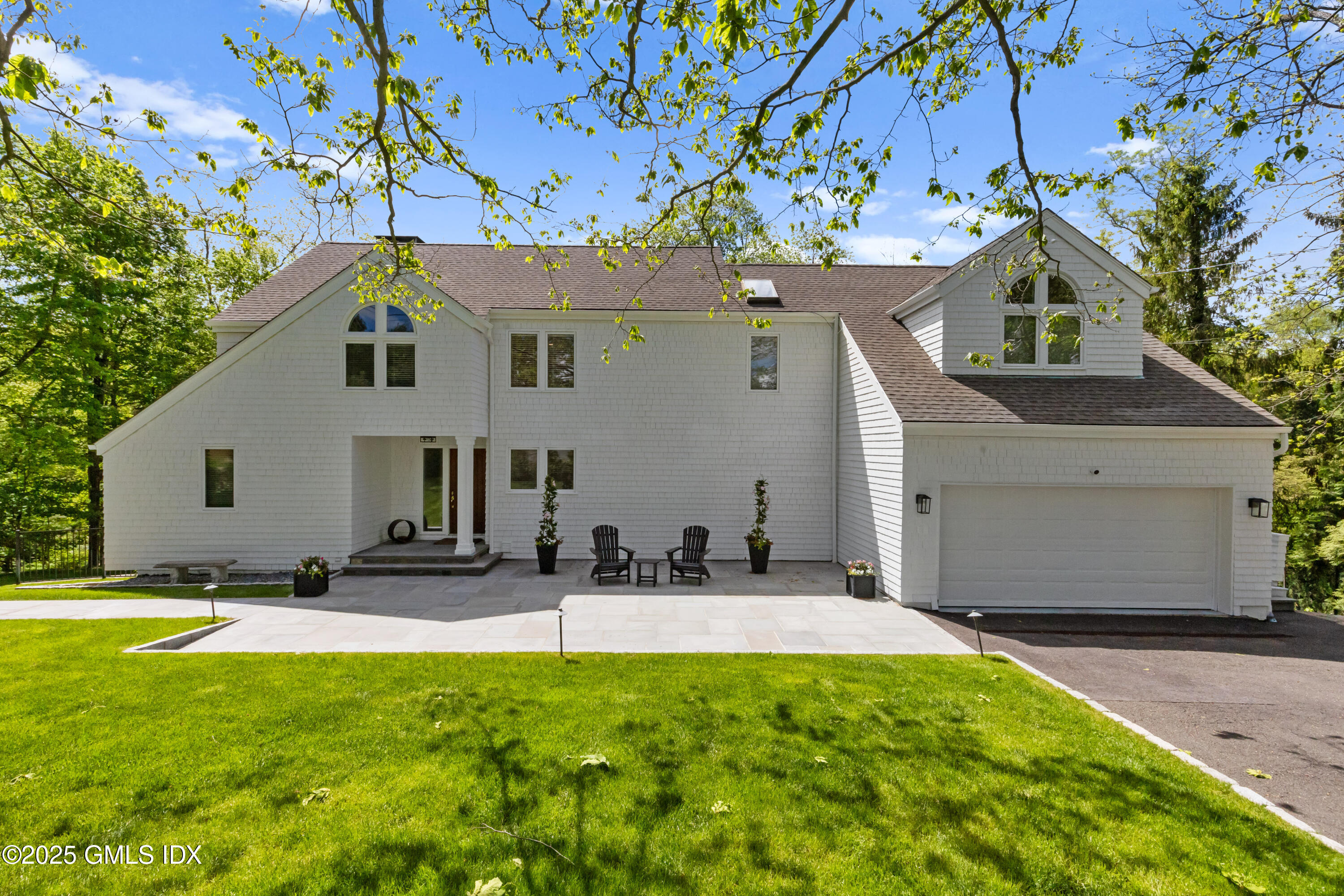 254 Stanwich Road Greenwich, CT 06830 - Photo 41 of 52 a front view of house with yard