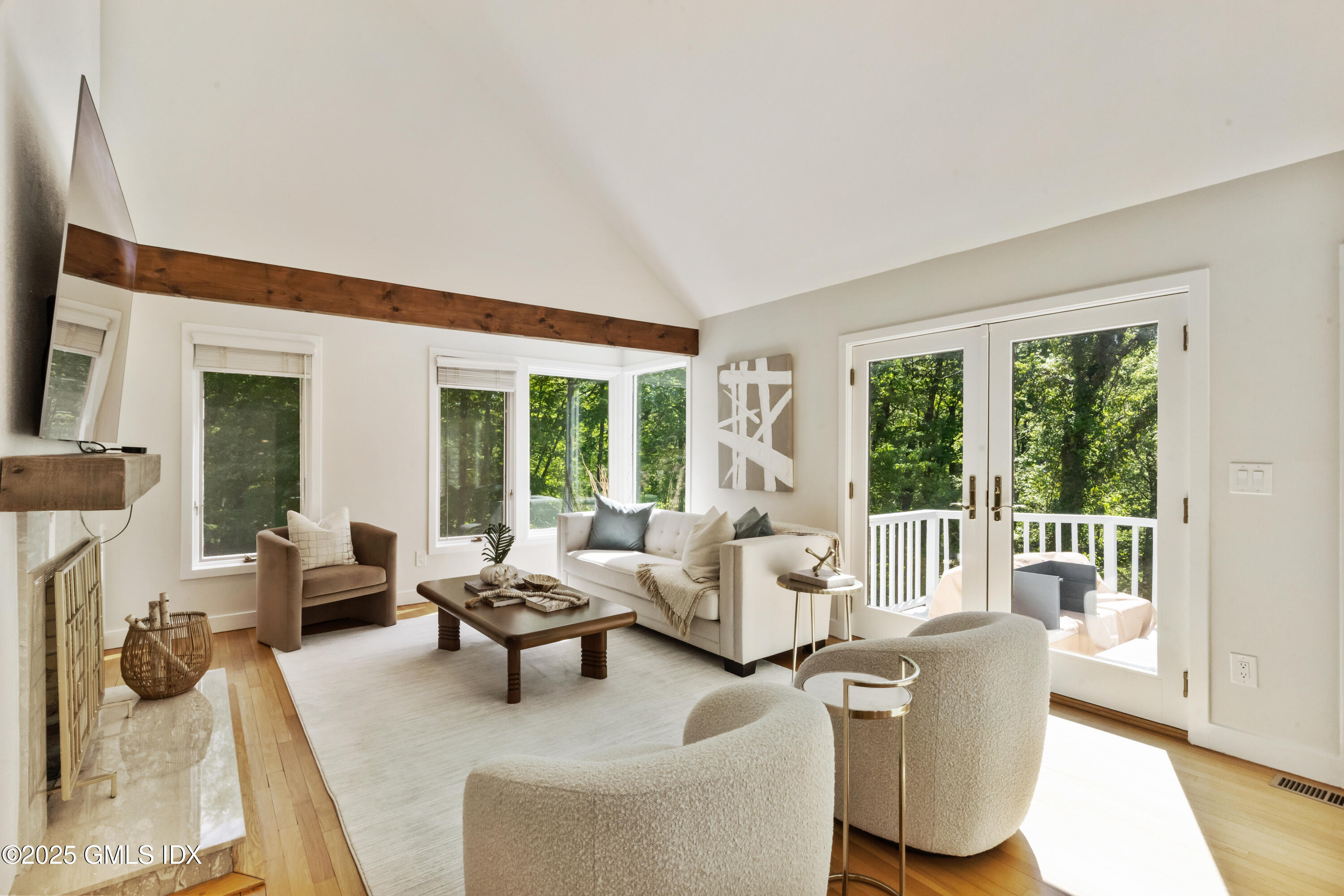 254 Stanwich Road Greenwich, CT 06830 - Photo 5 of 52 a living room with furniture and a large window