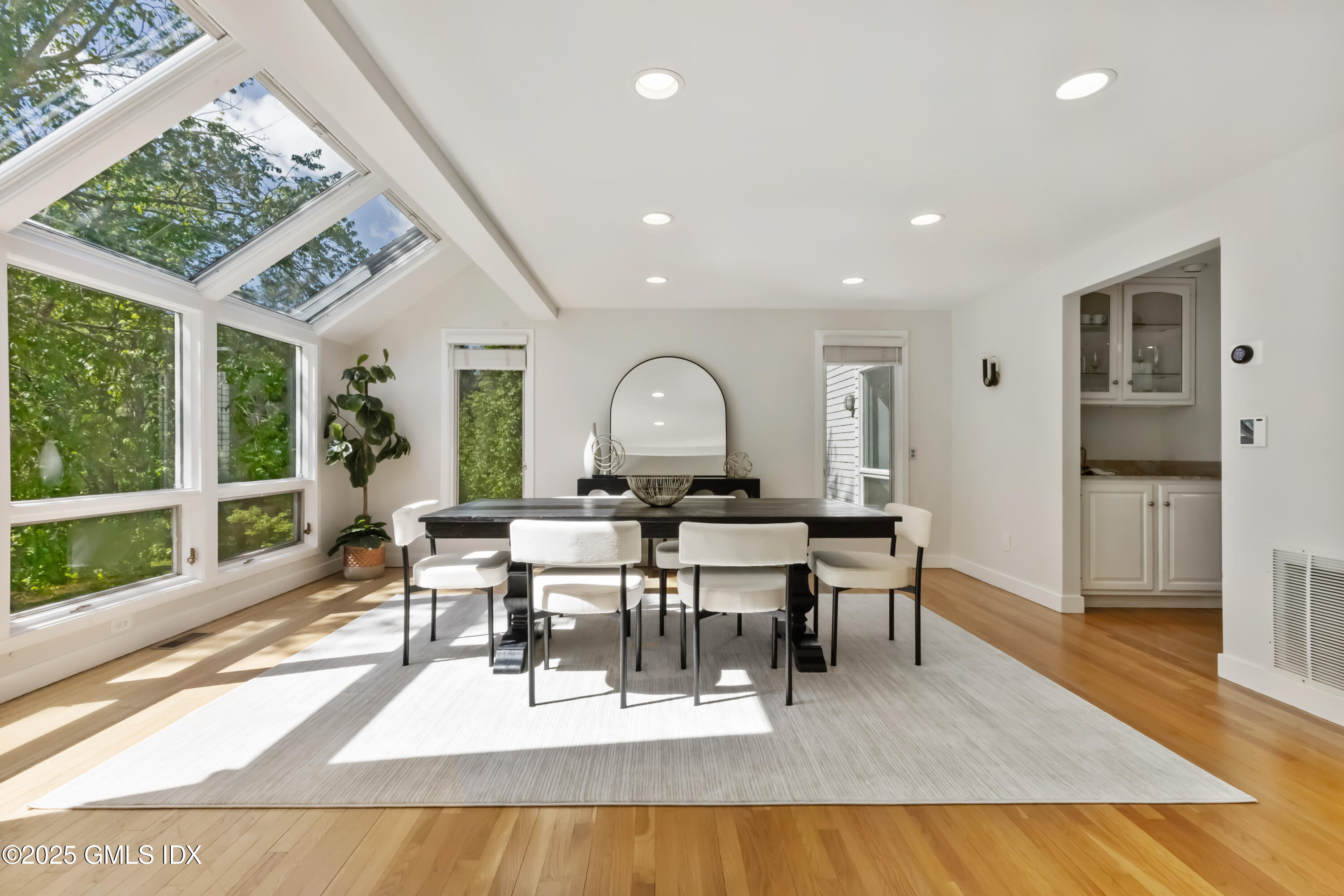 254 Stanwich Road Greenwich, CT 06830 - Photo 7 of 52 a view of a dining room with furniture window and wooden floor