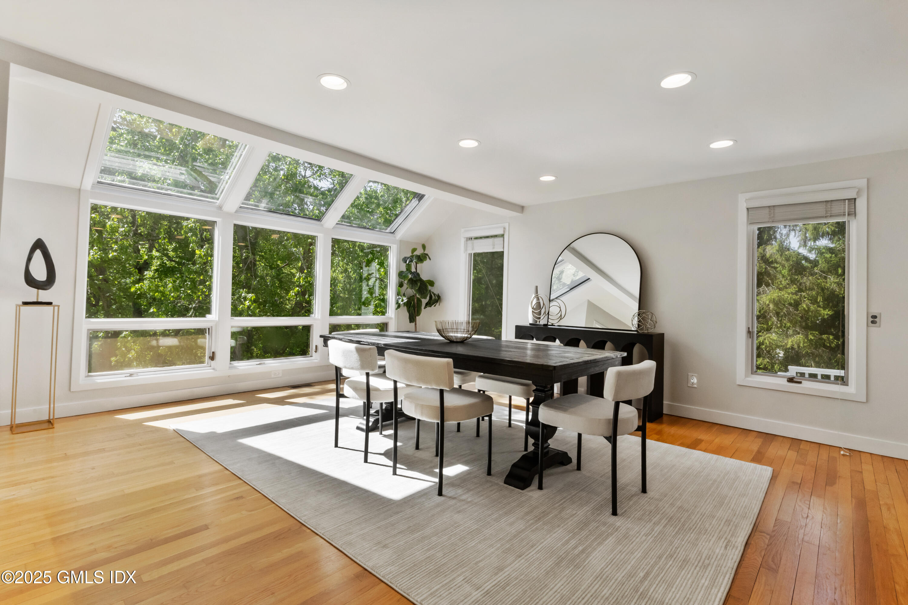 254 Stanwich Road Greenwich, CT 06830 - Photo 8 of 52 a view of a dining room with furniture window and wooden floor