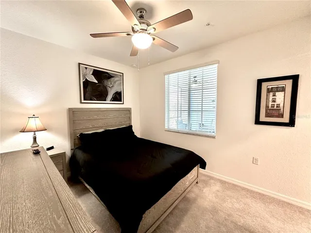 a bathroom with a sink toilet and mirror