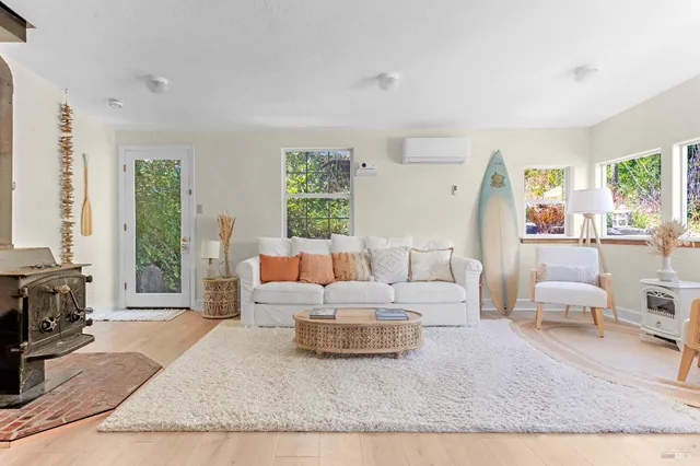 a living room with a couch and a table