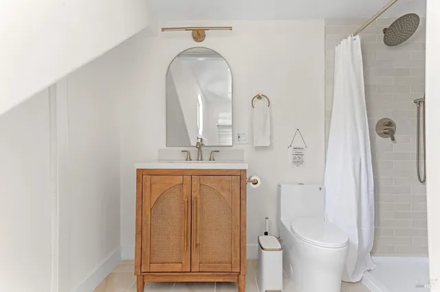 a bird view of a house with a backyard