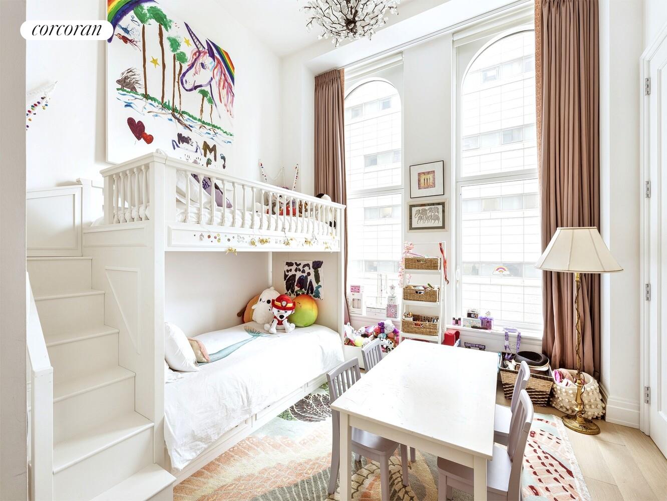 108 Leonard Street, Unit 4N Manhattan, NY 10013 - Photo 11 of 31 a bedroom with furniture and a window