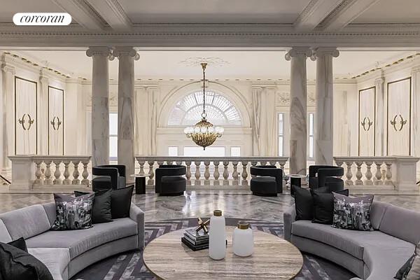108 Leonard Street, Unit 4N Manhattan, NY 10013 - Photo 13 of 31 a living room with furniture and a large window