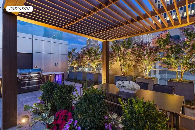 a view of a chairs and table in a patio