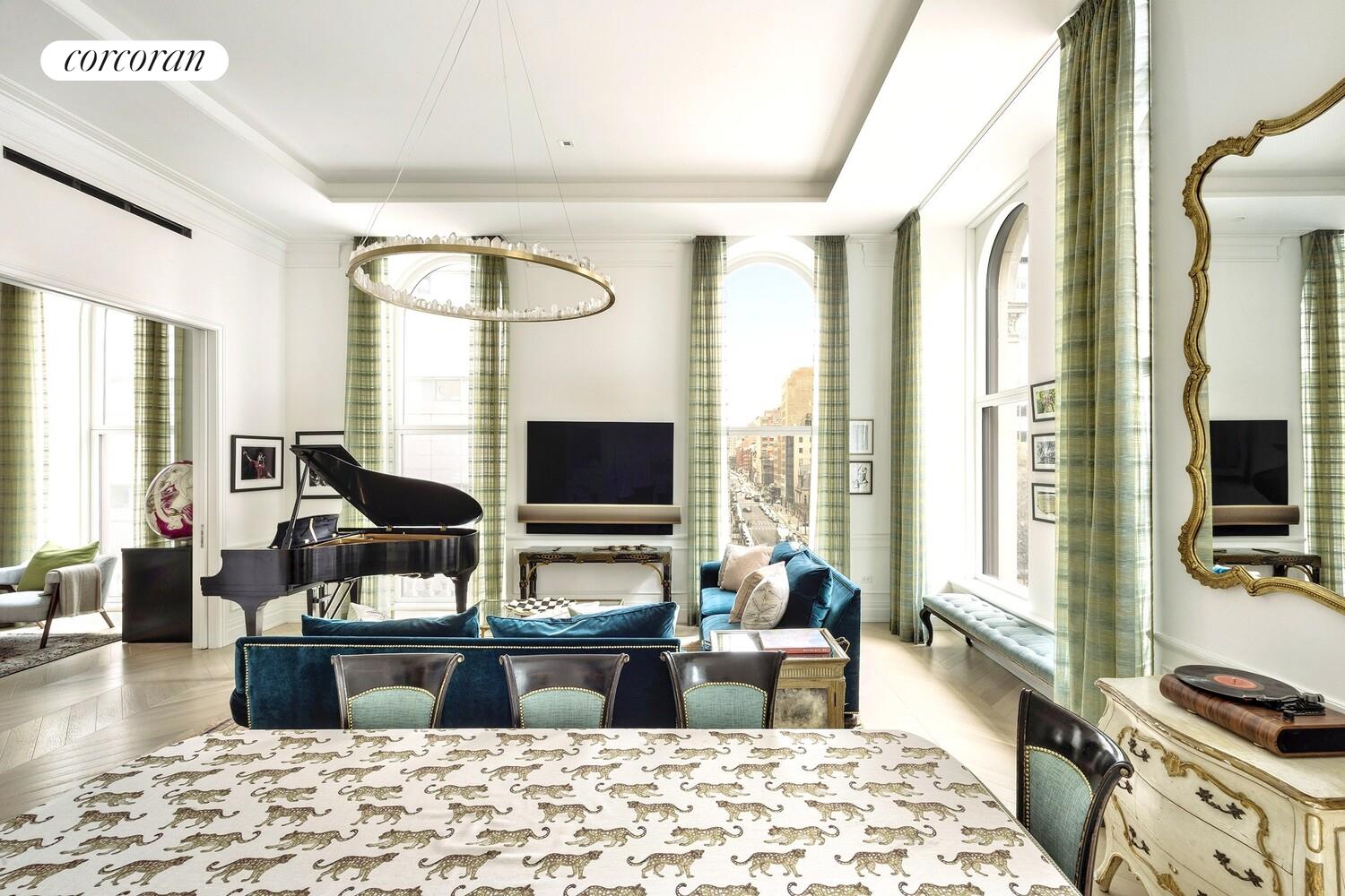 108 Leonard Street, Unit 4N Manhattan, NY 10013 - Photo 3 of 31 a living room with furniture fireplace and flat screen tv