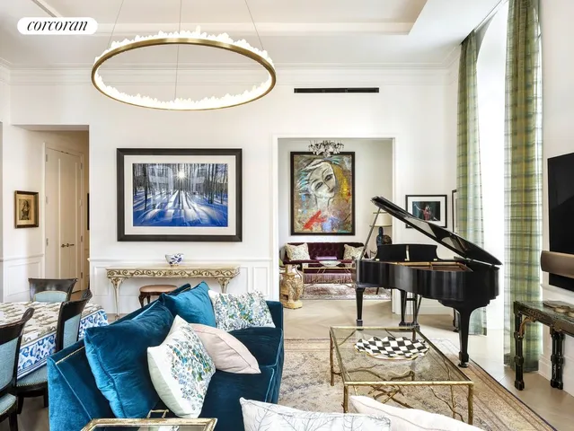 a living room with furniture fireplace and flat screen tv