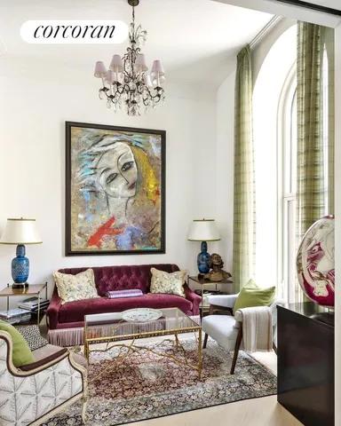 a living room with furniture and a table