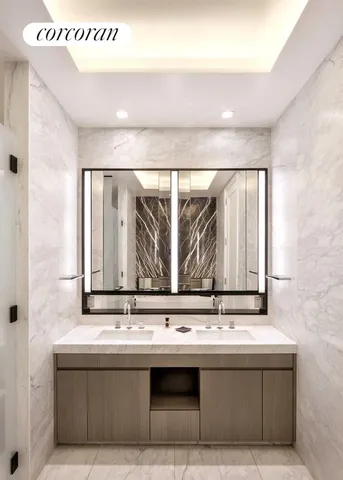 a bedroom with a bed and a table in it with window