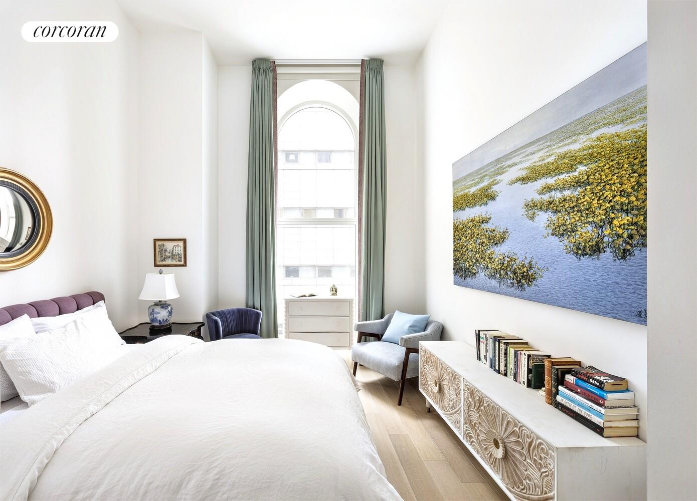 108 Leonard Street, Unit 4N Manhattan, NY 10013 - Photo 9 of 31 a bedroom with a bed and a large window