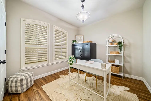 a workspace with furniture and a window