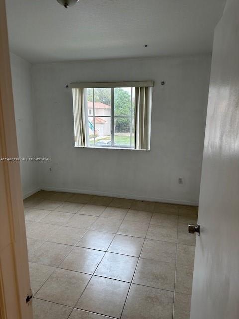 2920 Southeast 13th Road, Unit 20345 Homestead, FL 33035 - Photo 15 of 17 a view of a livingroom with an empty space and a window