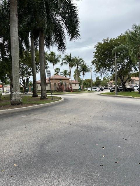 2920 Southeast 13th Road, Unit 20345 Homestead, FL 33035 - Photo 3 of 17 a view of a street