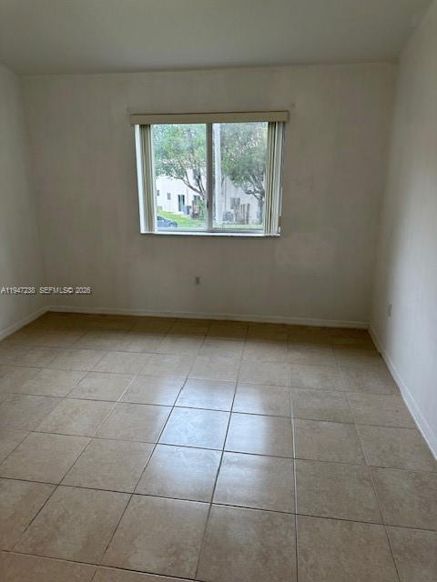 2920 Southeast 13th Road, Unit 20345 Homestead, FL 33035 - Photo 6 of 17 a view of an empty room with a window