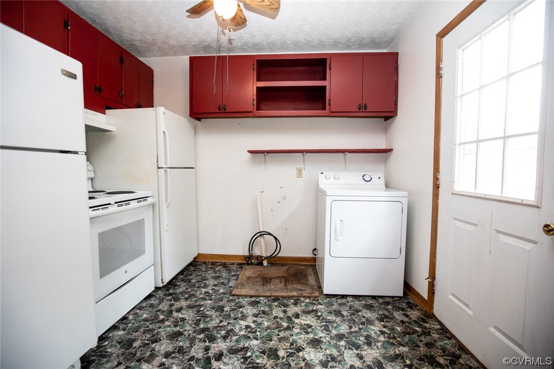 71 Spillman Road Farmville, VA 23901 - Photo 16 of 48 a kitchen with a refrigerator and a stove top oven